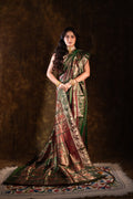 Mahakatha - Lush Green Baluchari Silk Saree with Grand Mythic Border Weaves