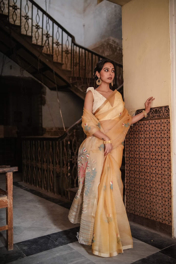 Golden Muslin Jamdani with Handwoven Floral Motifs Saree