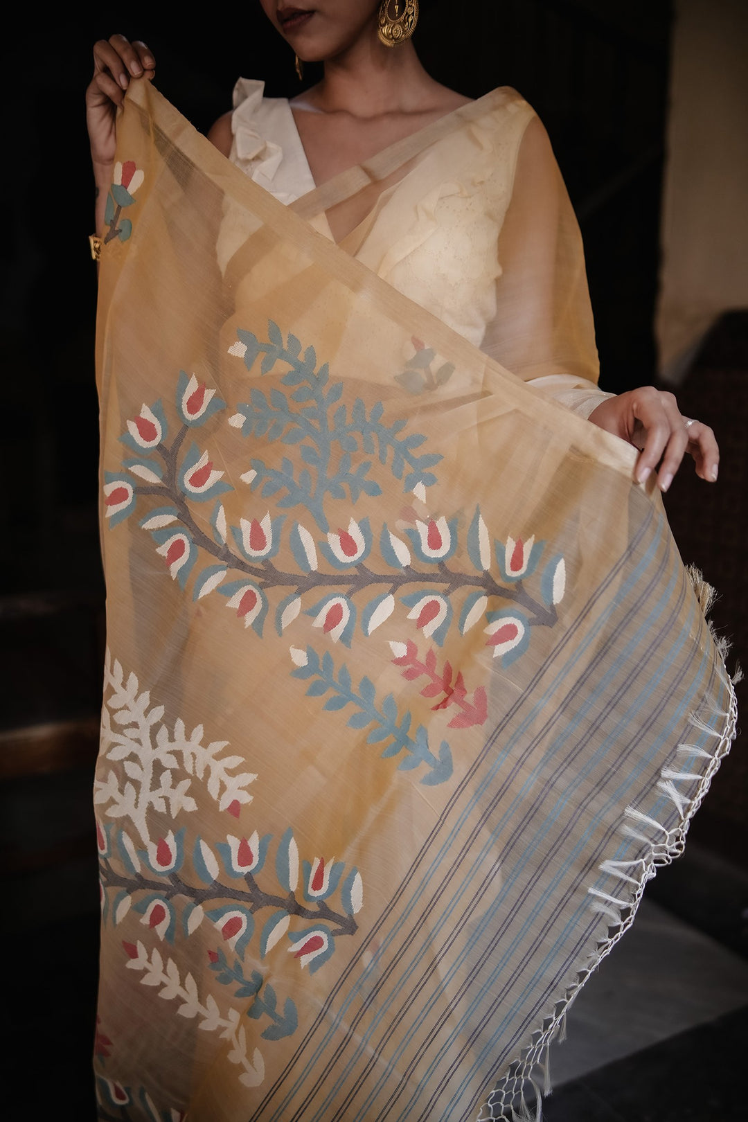 Golden Muslin Jamdani with Handwoven Floral Motifs Saree
